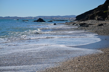 Med Sea on pebbly shore