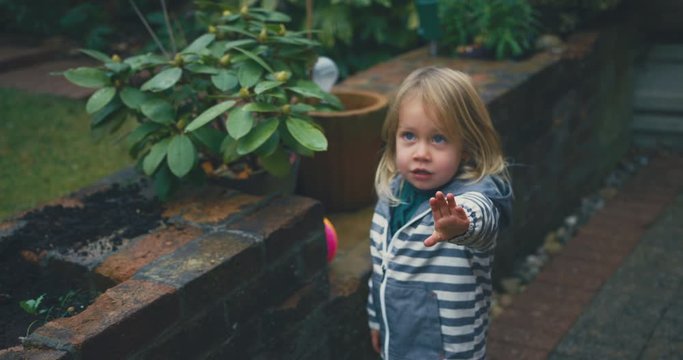 Toddler does not want to be filmed, user generated shot