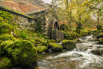 Old mill with a waterwheel built in the early 1800's in Borrowdale in the Lake District, Uk - obrazy, fototapety, plakaty
