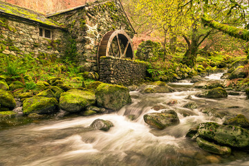 Old mill with a waterwheel built in the early 1800's in Borrowdale in the Lake District, Uk