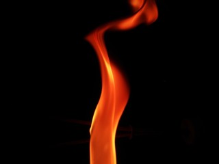 Red hot fire flame isolated on black background