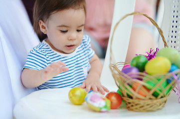 Child collect eggs in easter