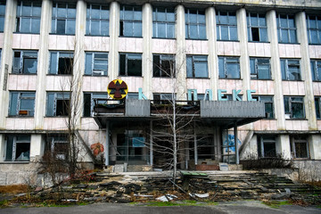 Abandoned ghost town Prypiat. Overgrown trees and collapsing buildings in Chornobyl exclusion zone....