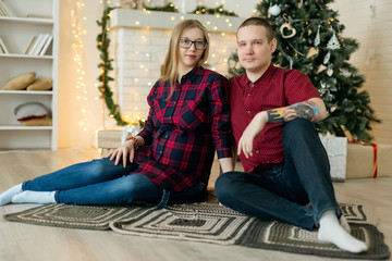 Married couple expecting baby at Christmas