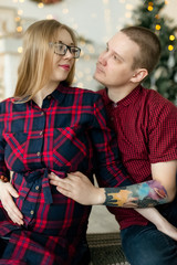 Married couple expecting baby at Christmas