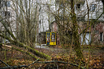 Abandoned ghost town Prypiat. Overgrown trees and collapsing buildings in Chornobyl exclusion zone....