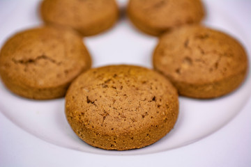 cookies on a white plate close up