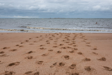Hjerting beach with footsteps in Ho Bay Esbjerg, Denmark