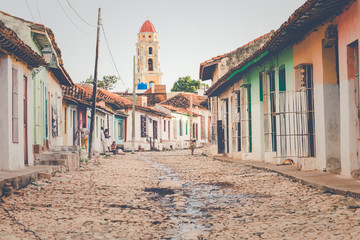 Colorful houses and vintage cars in Trinidad, Cuba. Unesco World Heritage Site.