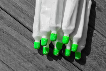 chuna on wooden table,lime powder Tube,Chuna,Pan wala Chuna, lime powder tubes,limestone powder tube Usage Cooking,high calcium chuna tube,cement mix usage limestone powder tube and lime