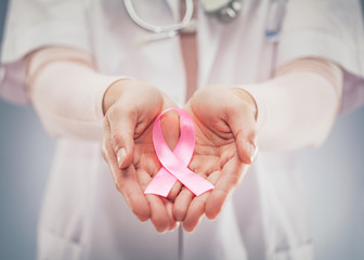 Pink ribbon concept. National cancer survivor day.