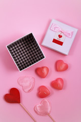 Love gift, candle and hearts.