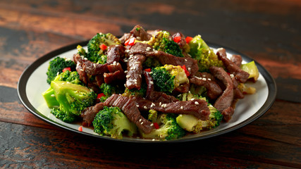 Homemade Beef and Broccoli on wooden table