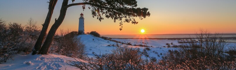 scenic sunrise on the laid back Baltic island of Hiddensee in beautiful winter landscape