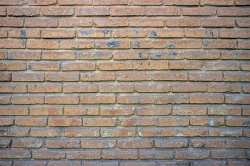 Red gray brown brick wall background.