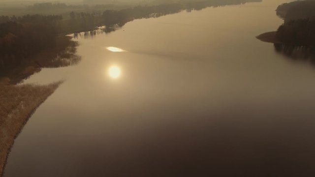 Polish longest lake at Masuria, Jeziorak at sunset. Drone, aerial footage.