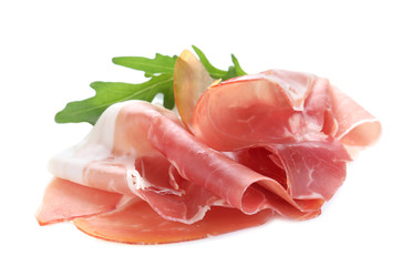 Slices of tasty prosciutto on white background