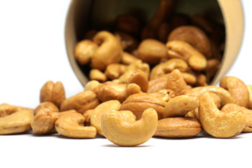 Cashew nut in brown box isolated white background - healthy food concept with copy space 