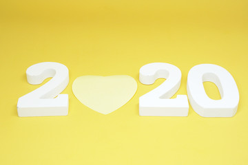 Single or Lonely Yellow Heart -  y ellow Heart Paper Object on yellow  Background - Valentine Day 2020 - Lover Concept  with Copy space                                                          