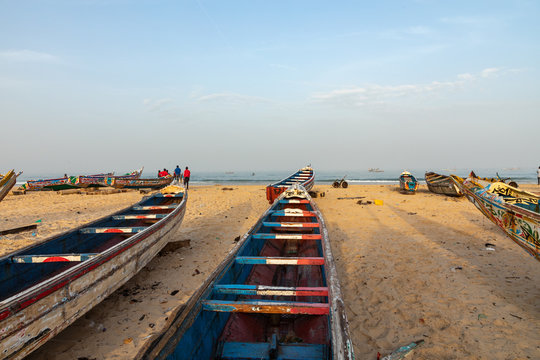 Traditional painted wooden fishing boat in Kayar, Senegal. West Africa.