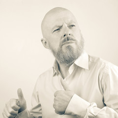 Portrait of an adult bearded man.