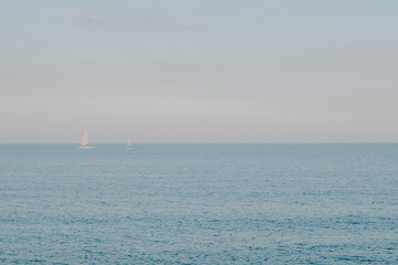 Obraz premium Summer sea. Blue water. Beach on sunrise