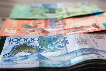 Obraz na płótnie Canvas Paper banknotes tenge KZT. Tenge is the national currency of Kazakhstan. bank of Kazakhstan