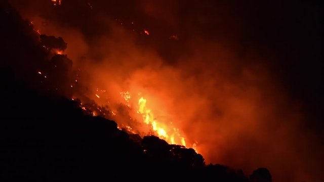 Night fire at Loutraki in Greece. Forest destroyed.