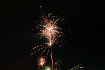 2020 New Year colorful fireworks exploding on the sky above Lacul Morii Lake, Bucharest, Romania -...