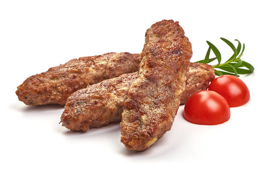 Fried american breakfast sausages, isolated on white background