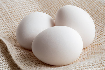 Three whole white eggs.