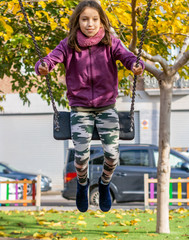 Little girl posing in park