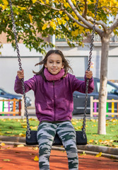 Little girl posing in park