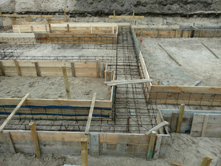 Foundation welding to receive concrete. the welder makes reinforcement for the foundation