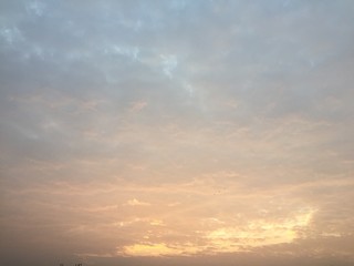 beautiful evening sky with slight red clouds in the sky