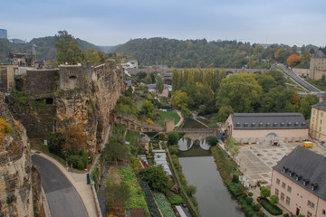 Fototapeta na wymiar view of the fortified city, the capital of the Grand Duchy of Luxembourg, is the richest state in Europe. Old medieval city with fortified walls, a cathedral and houses in the fall.