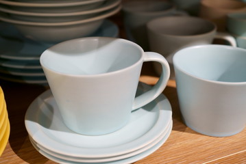 Fototapeta na wymiar Stack up cute cups and plates