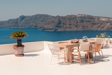 Classical view on the decoration and architecture of Oia village Santorini at sun weather