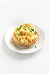 Scrambled eggs on bun
