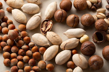 Fresh nut assortment top view, pecan and hazelnuts