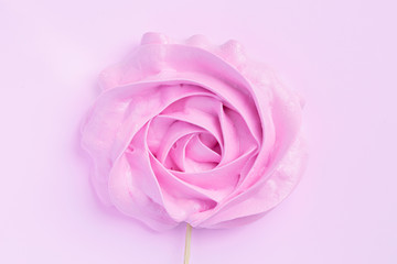 Fototapeta na wymiar Pink Rose meringues in pastel colors on a pink background. Valentine, Mom's Day.Medicine. Women Health