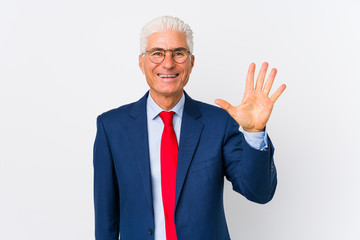 Middle aged caucasian business man isolated smiling cheerful showing number five with fingers.