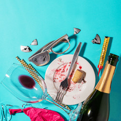 Conceptual background morning after night party, dirty dishes,empty bottle of champagne or wine,...