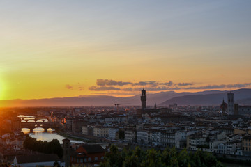 Fototapeta na wymiar Panoramic view from Piazzale Michelangelo in Florence. Sunset over river Arno in Florence, Italy.