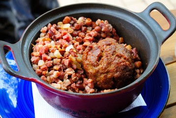 Traditional Dutch marrowfat peas and bacon dish, served with meatball in a hot pot