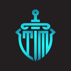 TM Logo monogram with sword and shield combination isolated blue colors gradient