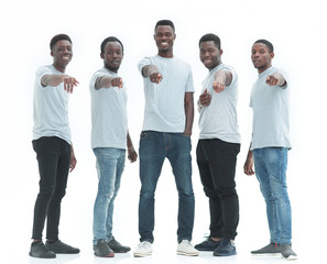 Fototapeta premium in full growth. a group of happy guys pointing at you.
