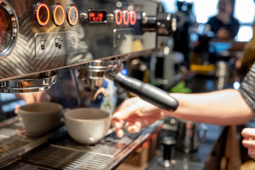 Fototapeta na wymiar Automatic coffee machine preparing espresso