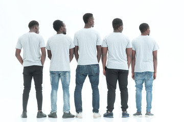 rear view. group of guys looking at white blank screen.