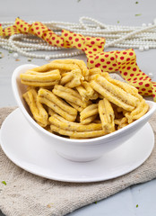 Indian Traditional Popular Gujarati Snack Ghatiya Also Know as Ganthiya, Papdi, Gathiya Are Deep Fried Snack Made From Chickpea Flour